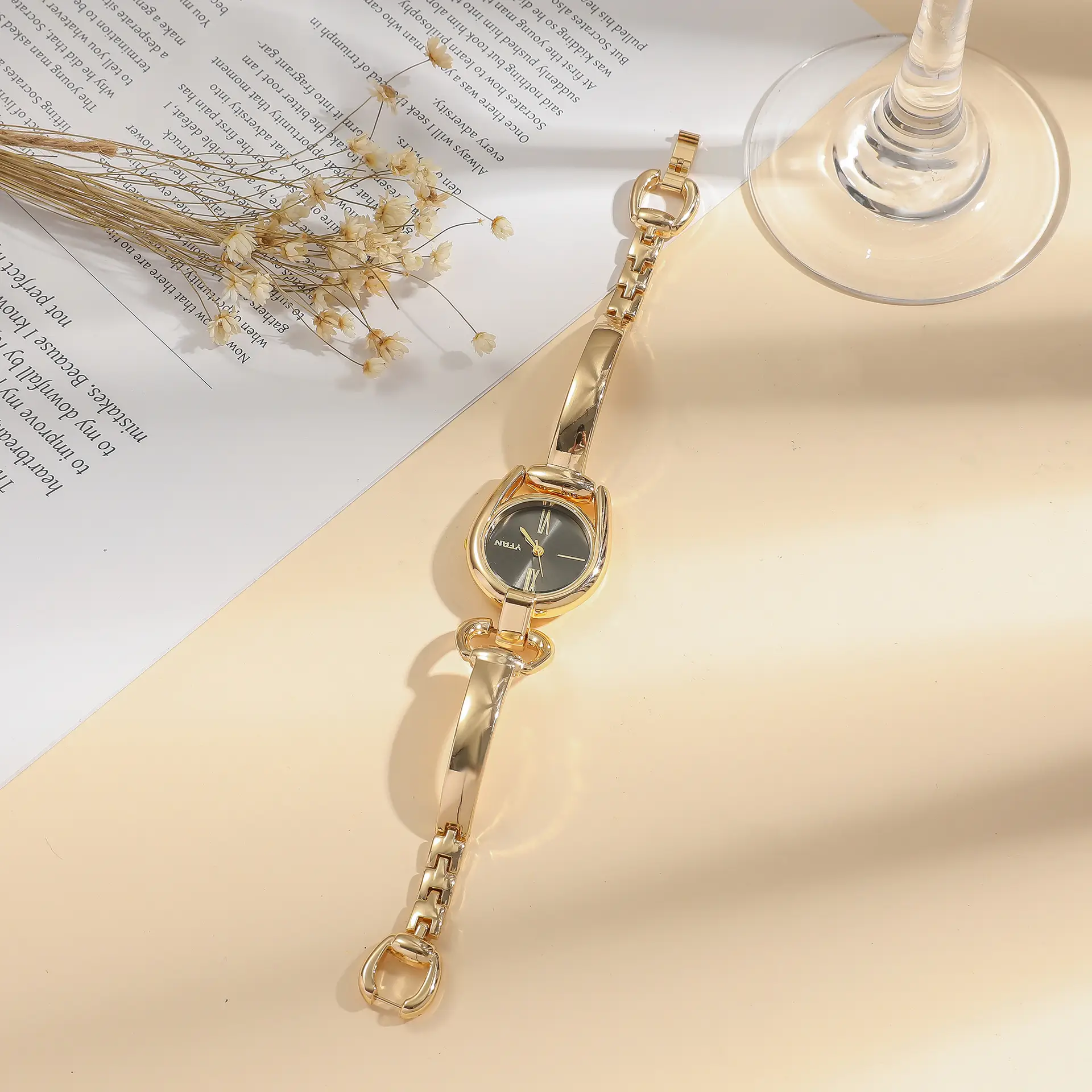 Women's Retro Button Watch with Hollow Steel Band — feature 10