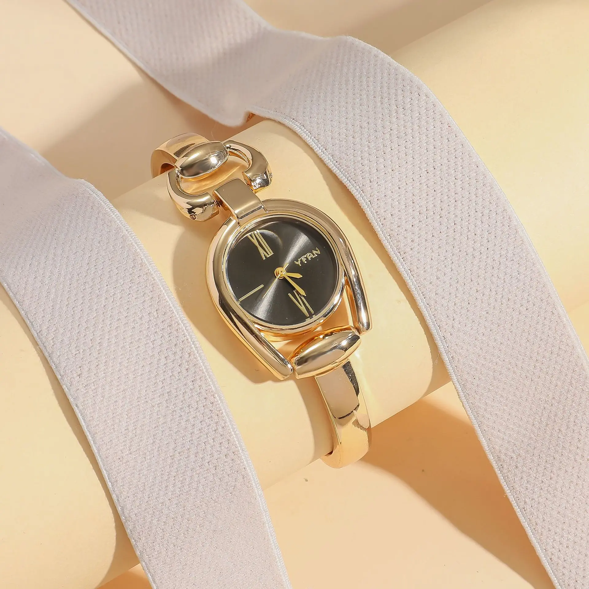 Women's Retro Button Watch with Hollow Steel Band — feature 14