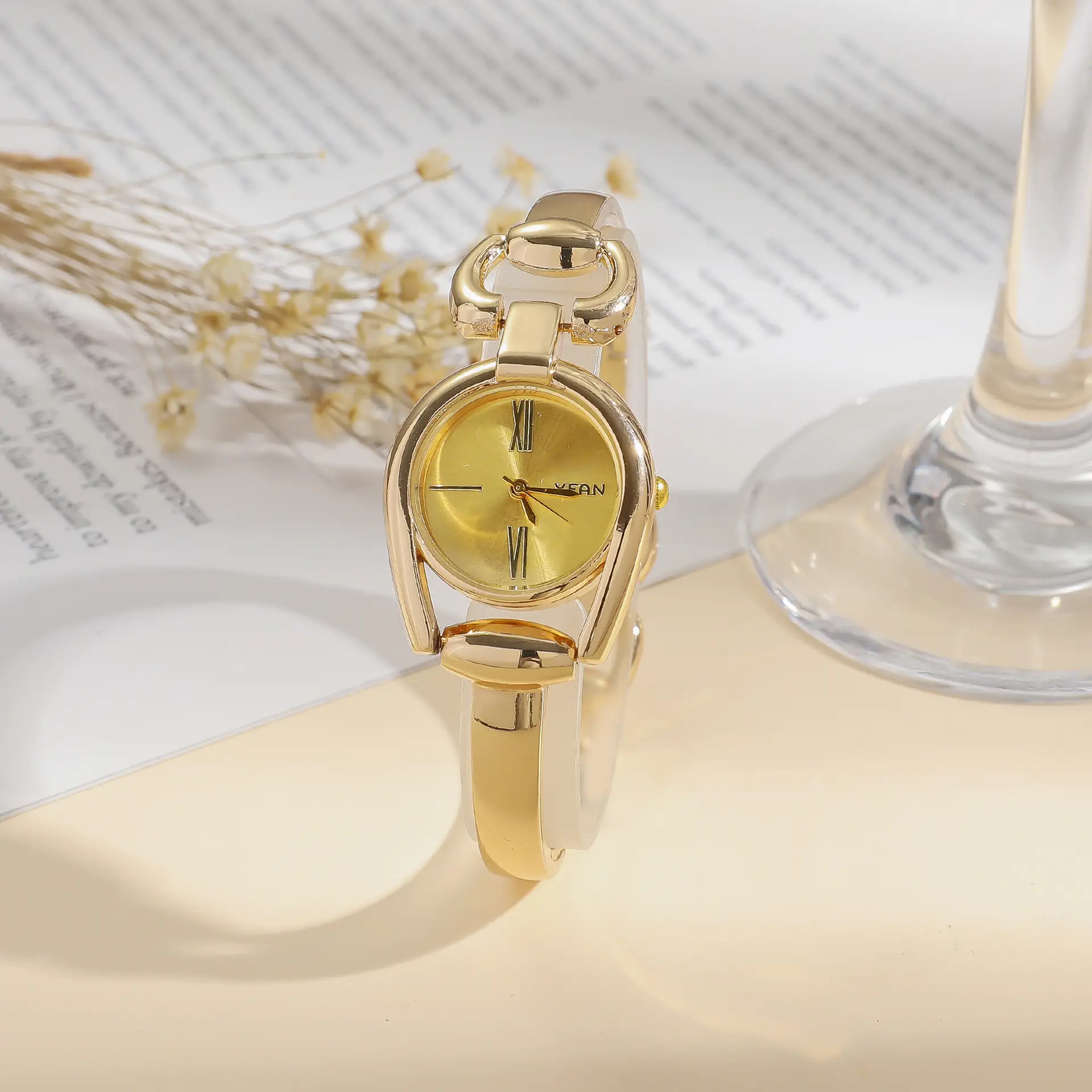 Women's Retro Button Watch with Hollow Steel Band — feature 16