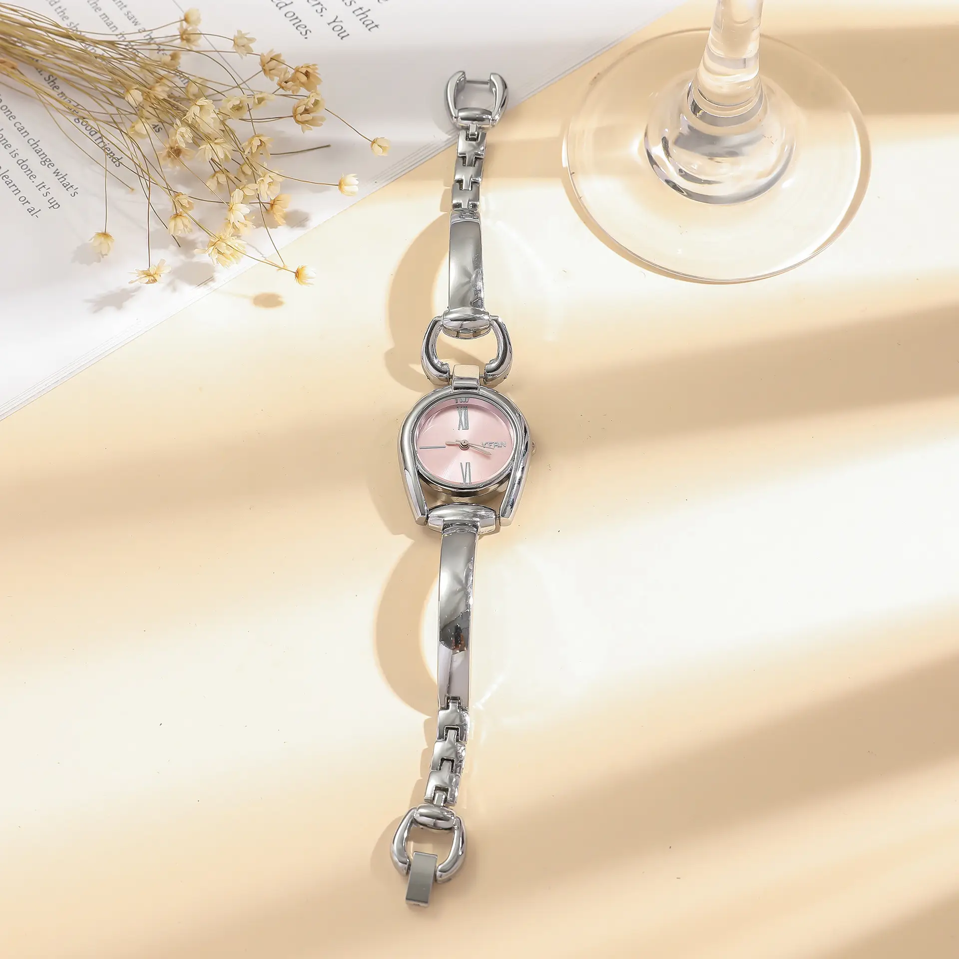 Women's Retro Button Watch with Hollow Steel Band — feature 27