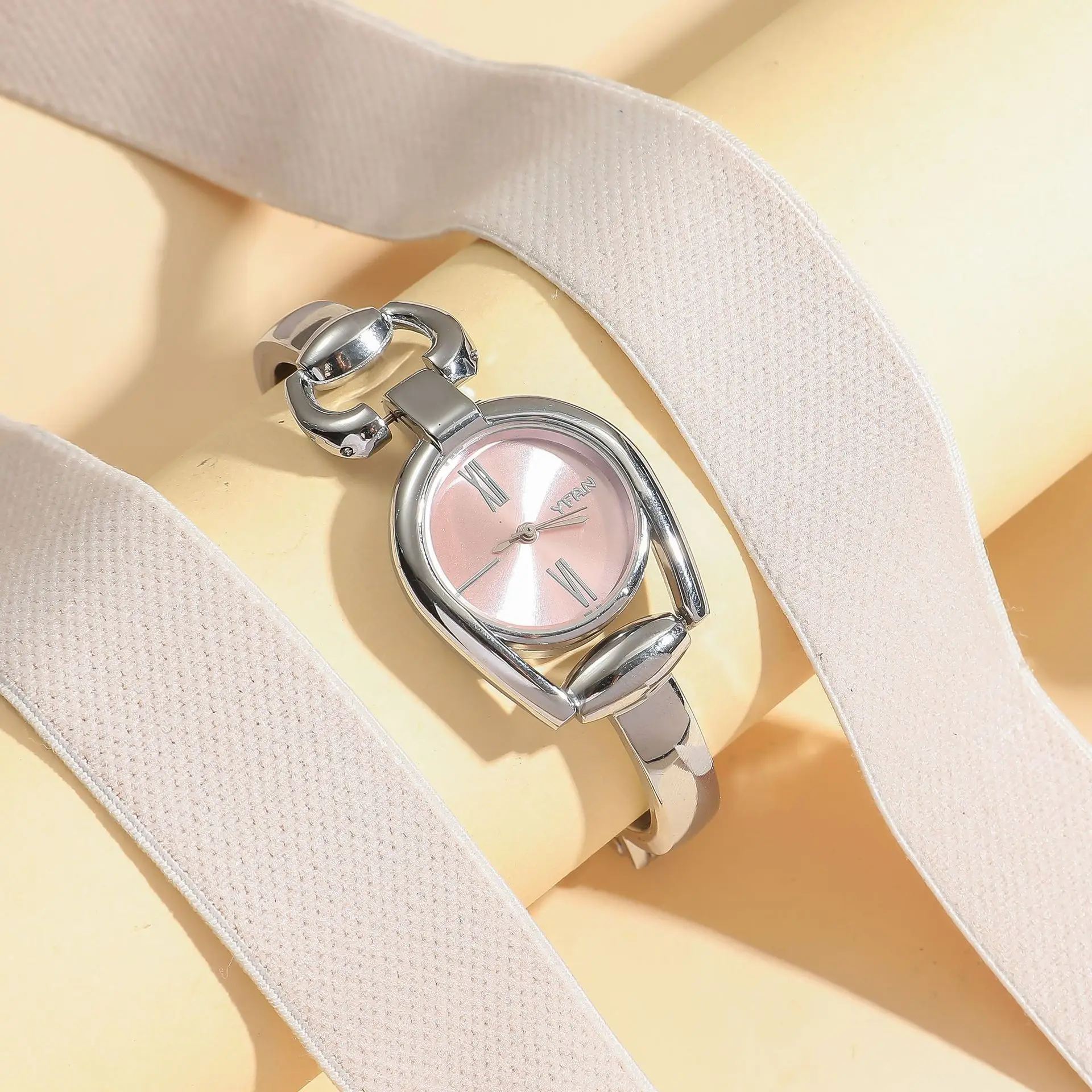 Women's Retro Button Watch with Hollow Steel Band — feature 29