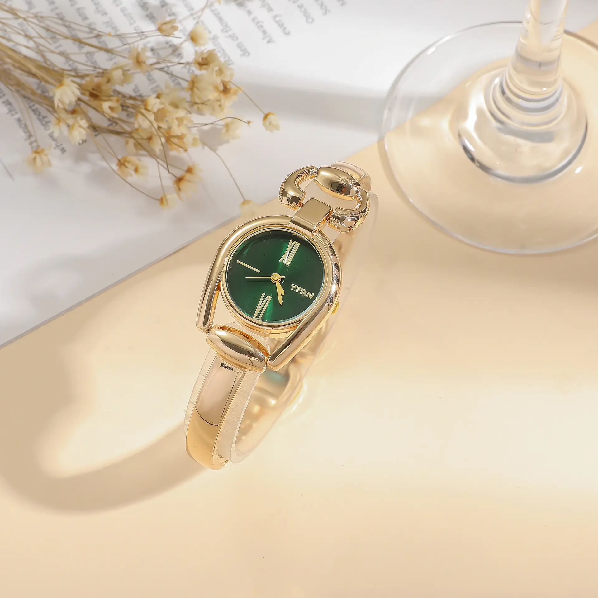 Women's Retro Button Watch with Hollow Steel Band — feature 5
