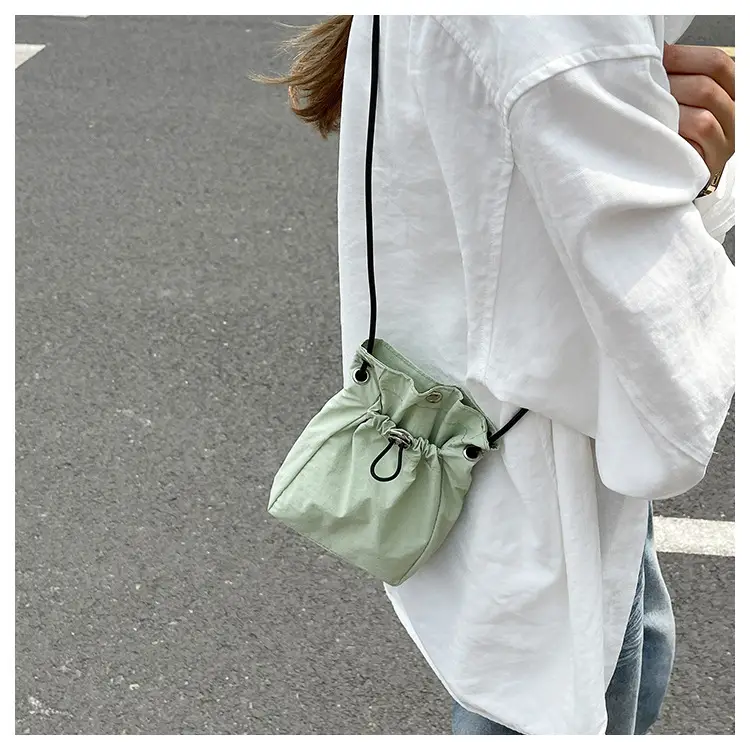 Women Drawstring Bucket Bag Cream Nylon Shoulder Crossbody — feature 24