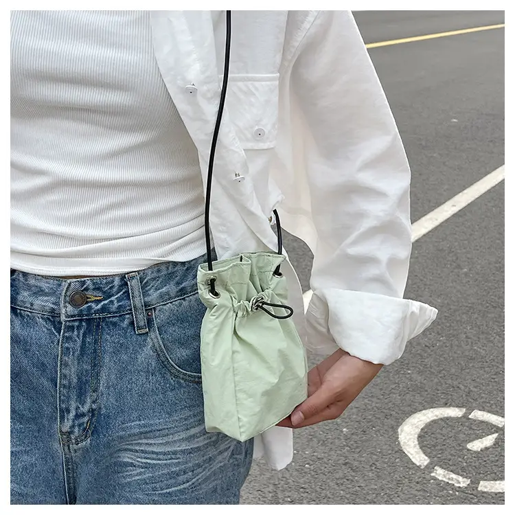 Women Drawstring Bucket Bag Cream Nylon Shoulder Crossbody — feature 26