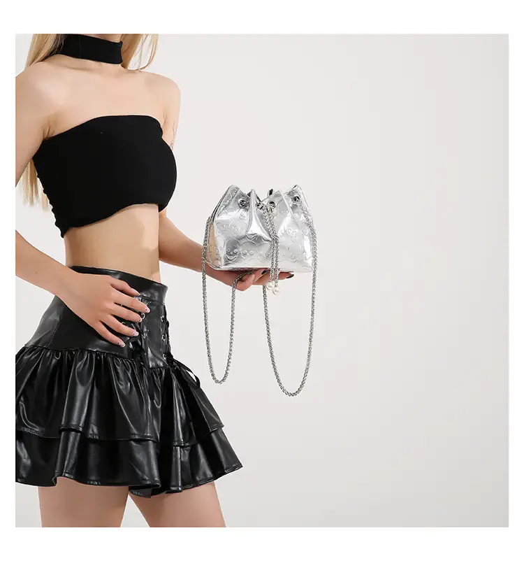 Golden Drawstring Bucket Bag with Chain Crossbody Strap — feature 17