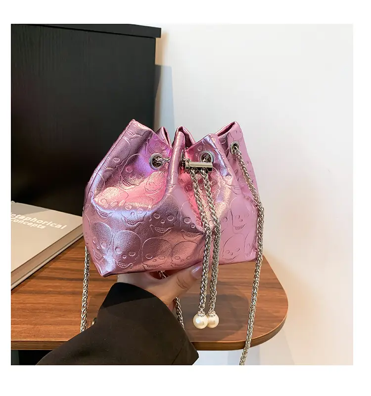 Golden Drawstring Bucket Bag with Chain Crossbody Strap — feature 23