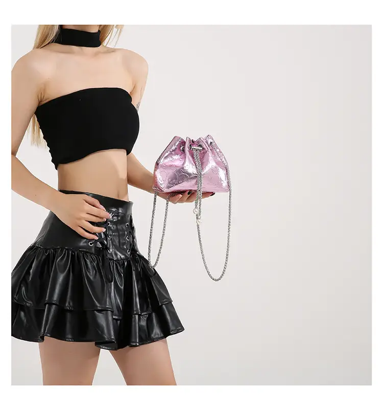 Golden Drawstring Bucket Bag with Chain Crossbody Strap — feature 25
