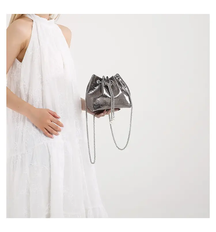 Golden Drawstring Bucket Bag with Chain Crossbody Strap — feature 33