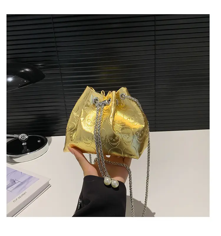 Golden Drawstring Bucket Bag with Chain Crossbody Strap — feature 40