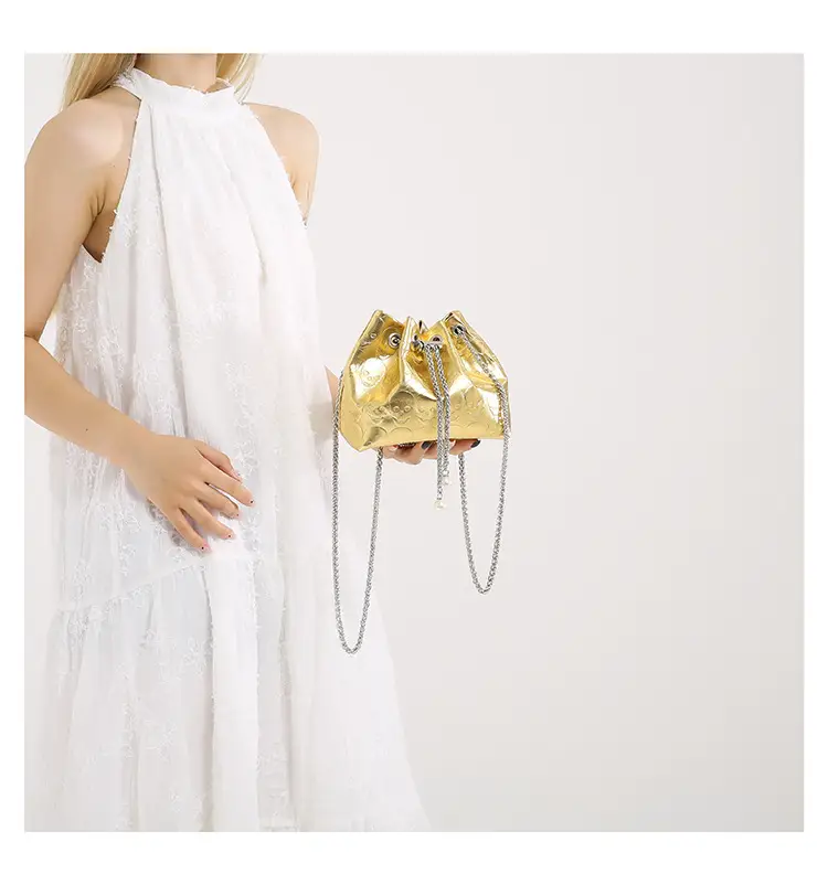 Golden Drawstring Bucket Bag with Chain Crossbody Strap — feature 41