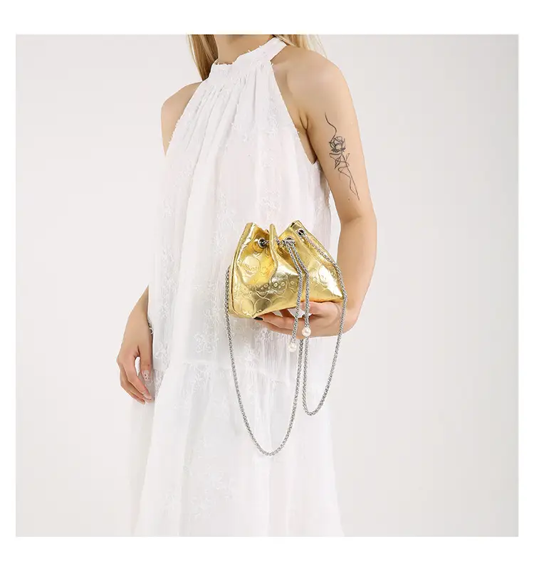 Golden Drawstring Bucket Bag with Chain Crossbody Strap — feature 42