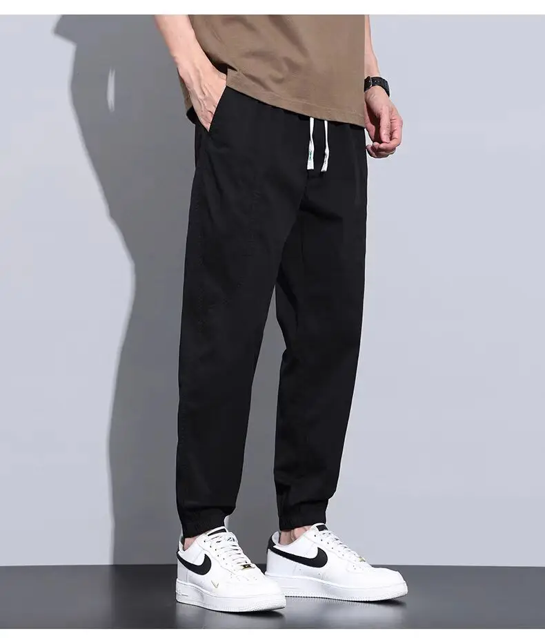Men's Slim Fit Olive Green Sweatpants with White Sneakers — feature 16
