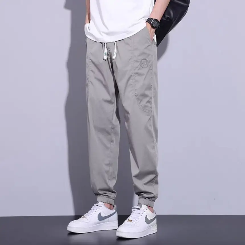 Men's Slim Fit Olive Green Sweatpants with White Sneakers - Image 2