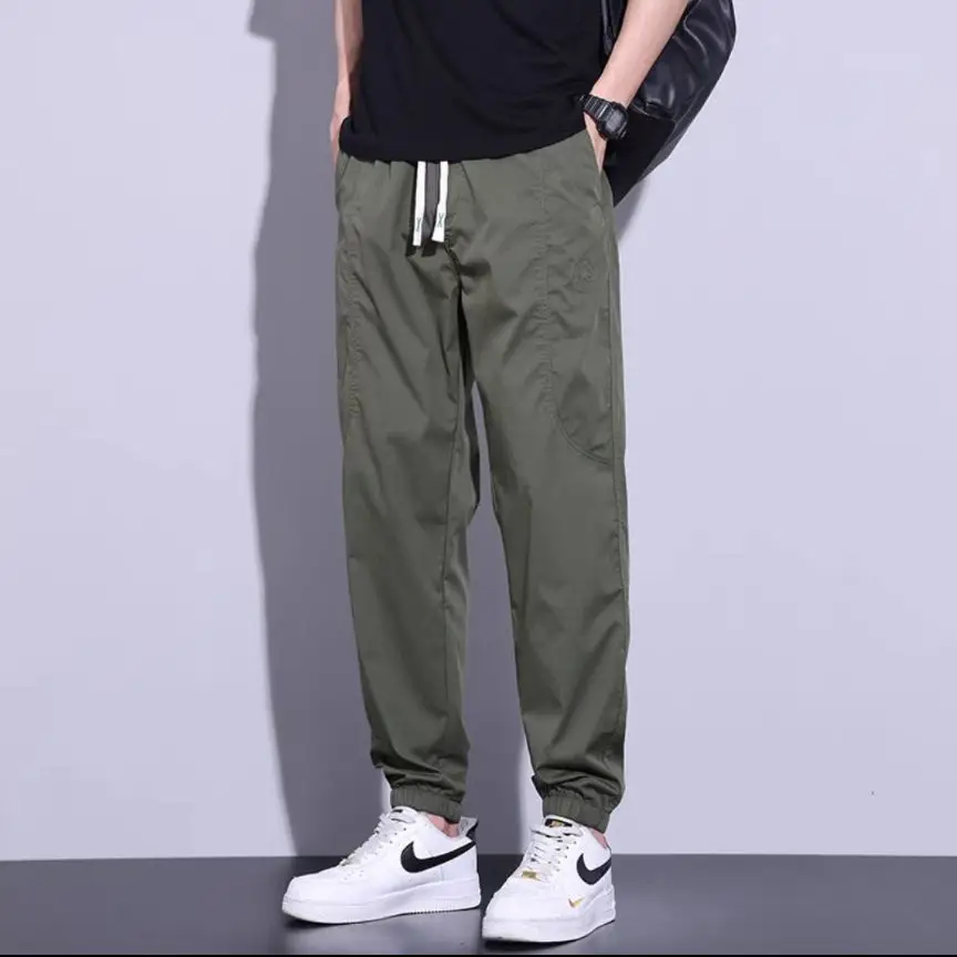 Men's Slim Fit Olive Green Sweatpants with White Sneakers - Image 3