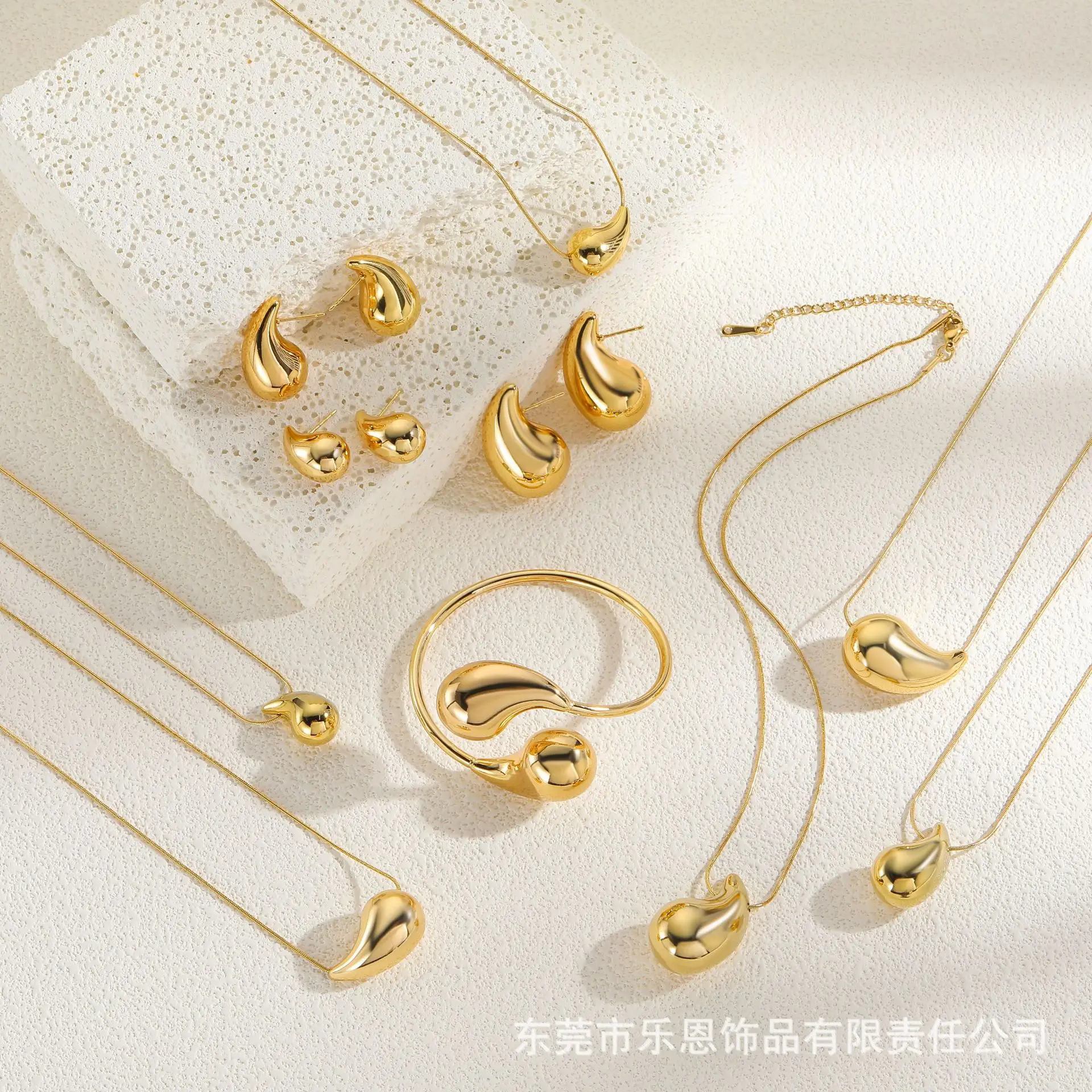 Golden Hollow Water Drop Necklace & Earrings Set for Women - Image 16