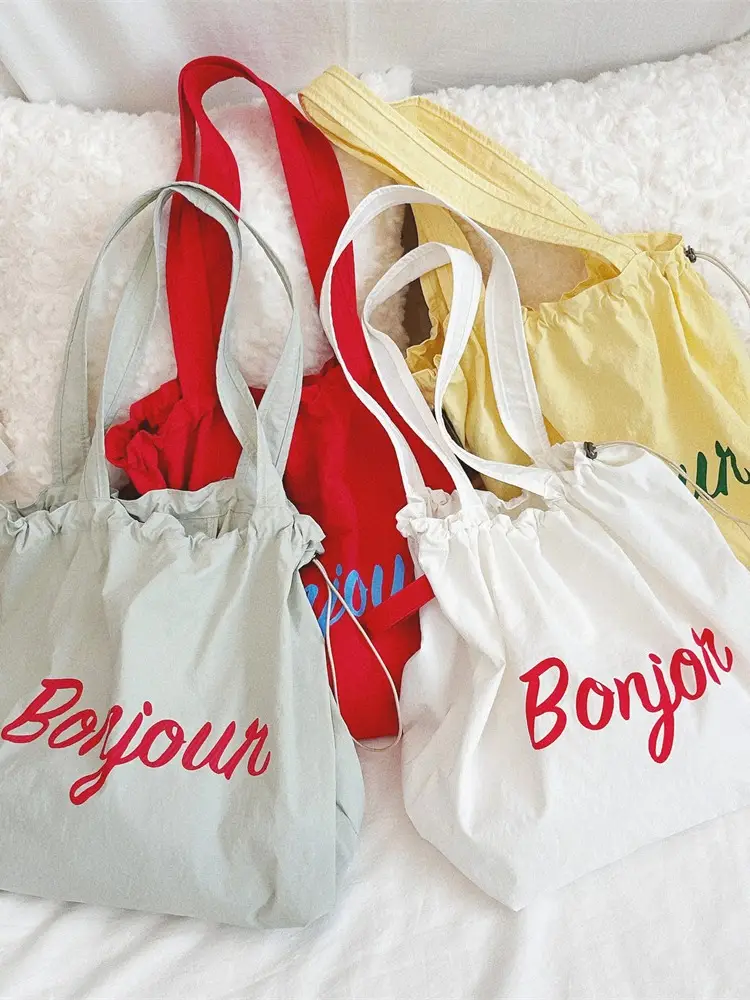 Korean Style Drawstring Shoulder Bag with Red Print - Image 6