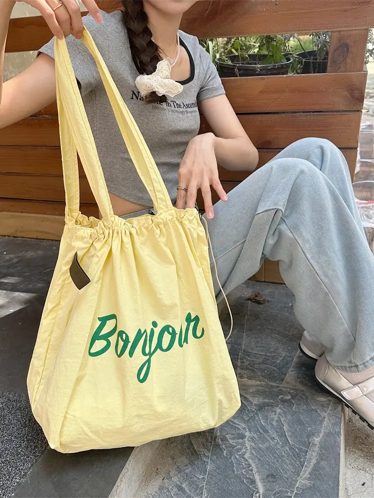 Korean Style Drawstring Shoulder Bag with Red Print - Image 7