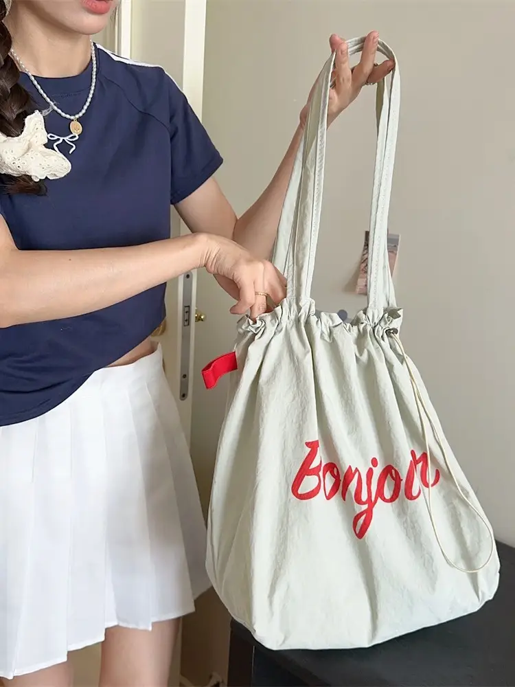 Korean Style Drawstring Shoulder Bag with Red Print - Image 8