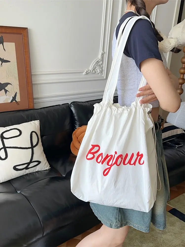 Korean Style Drawstring Shoulder Bag with Red Print - Image 9