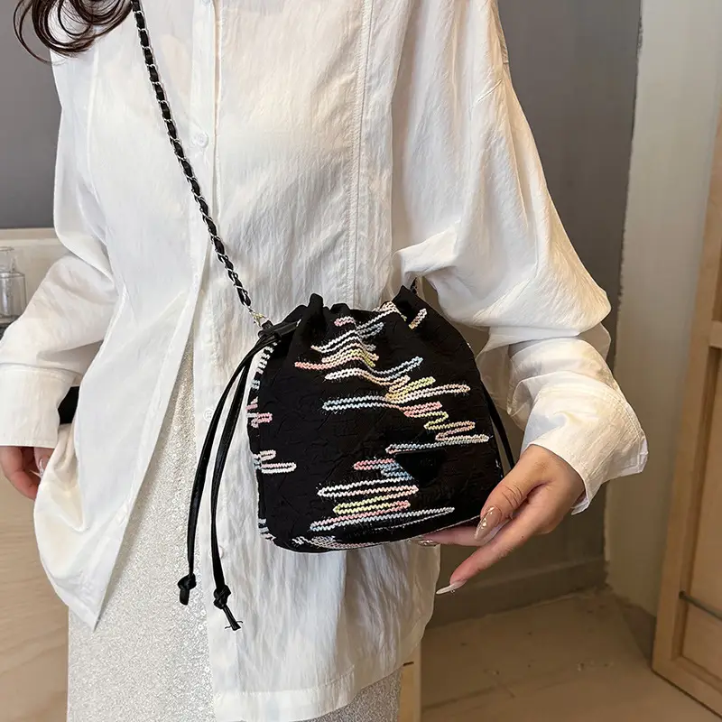 Yellow Drawstring Bucket Bag with Embroidery and Chain Strap