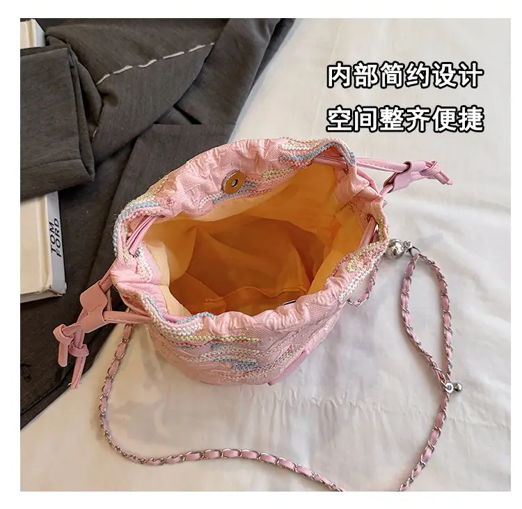 Yellow Drawstring Bucket Bag with Embroidery and Chain Strap — feature 11