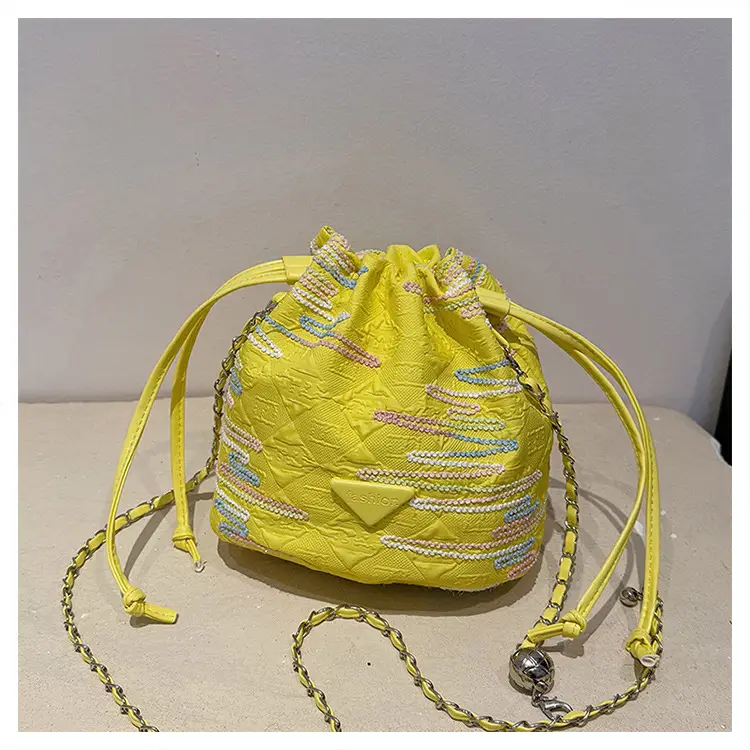 Yellow Drawstring Bucket Bag with Embroidery and Chain Strap — feature 31