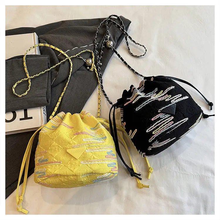 Yellow Drawstring Bucket Bag with Embroidery and Chain Strap — feature 37