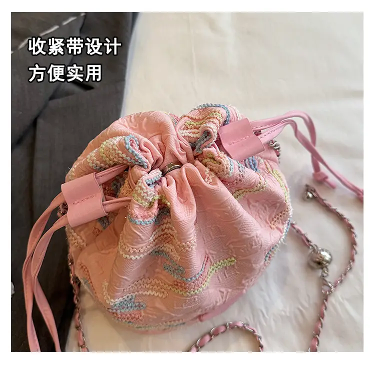 Yellow Drawstring Bucket Bag with Embroidery and Chain Strap — feature 9