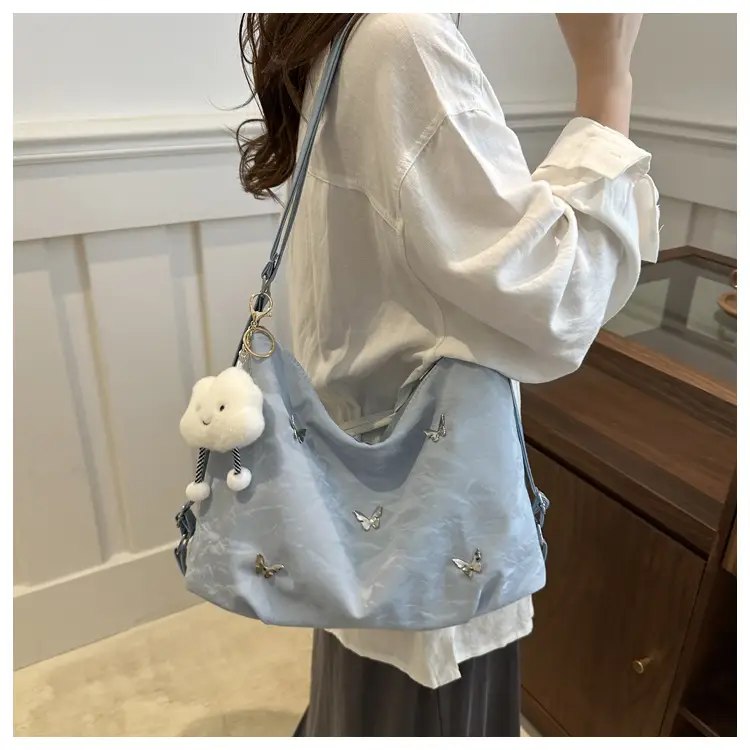 Women's Creamy Soft Shoulder Bag with Pom Pom Design — feature 16