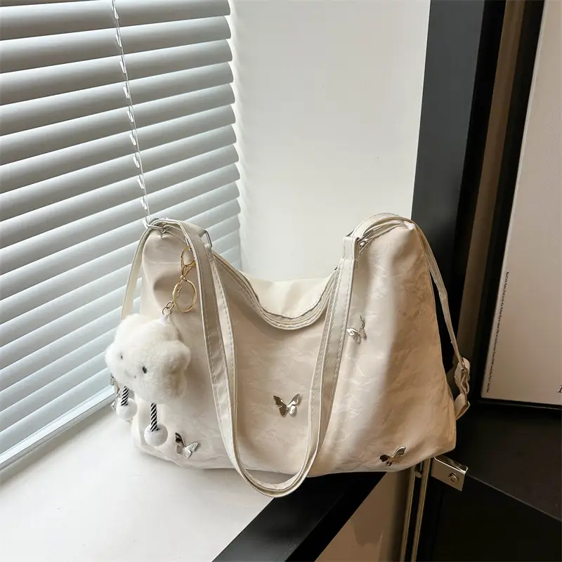 Women's Creamy Soft Shoulder Bag with Pom Pom Design - Image 2