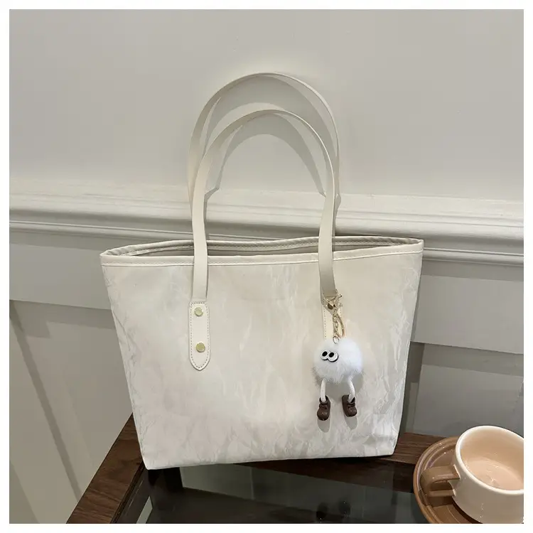 Women's White Canvas Shoulder Bag with Pom Pom Charm — feature 22
