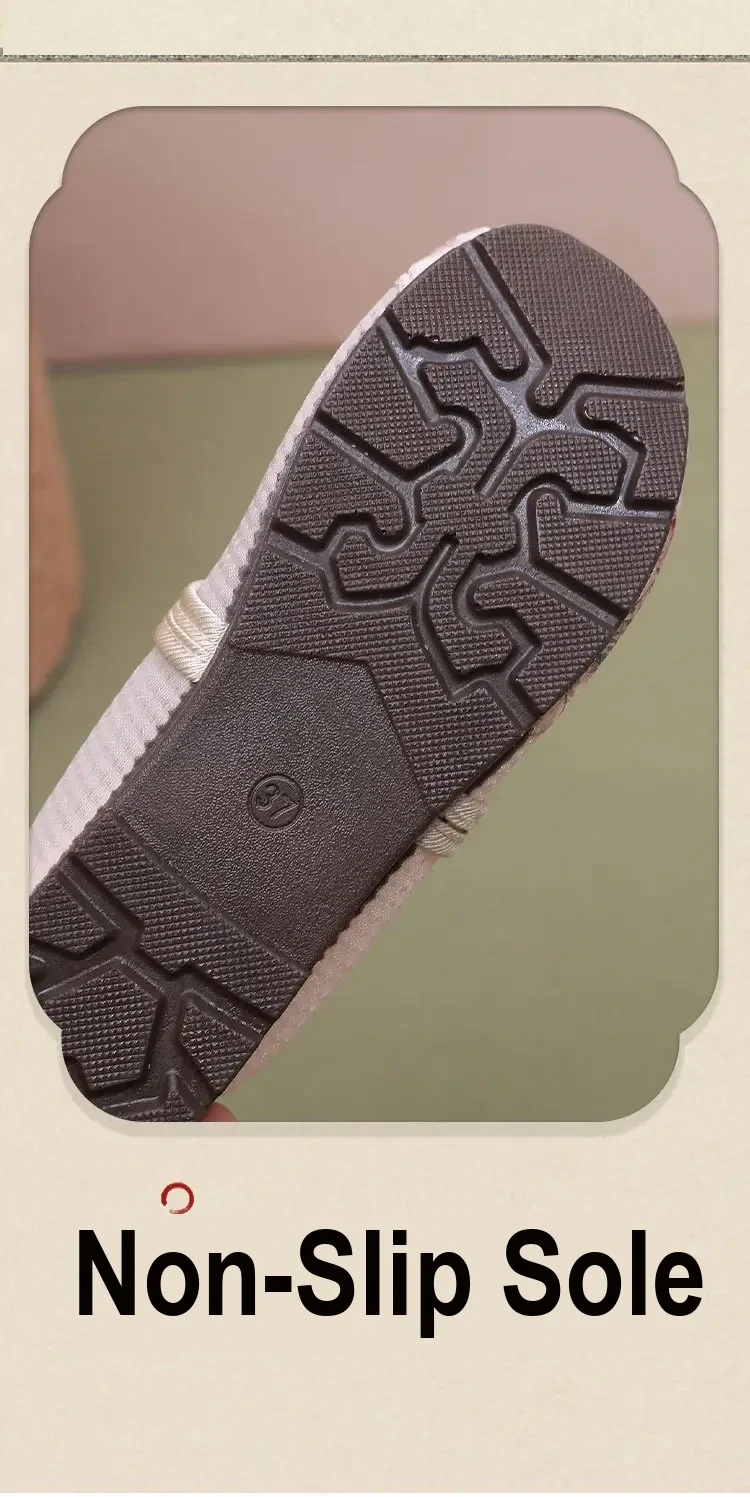 Close-up of the dark patterned outsole with a molded size marking.