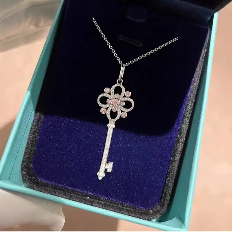 Women's Gold Snowflake Key Pendant Necklace with Diamond Chain — feature 1