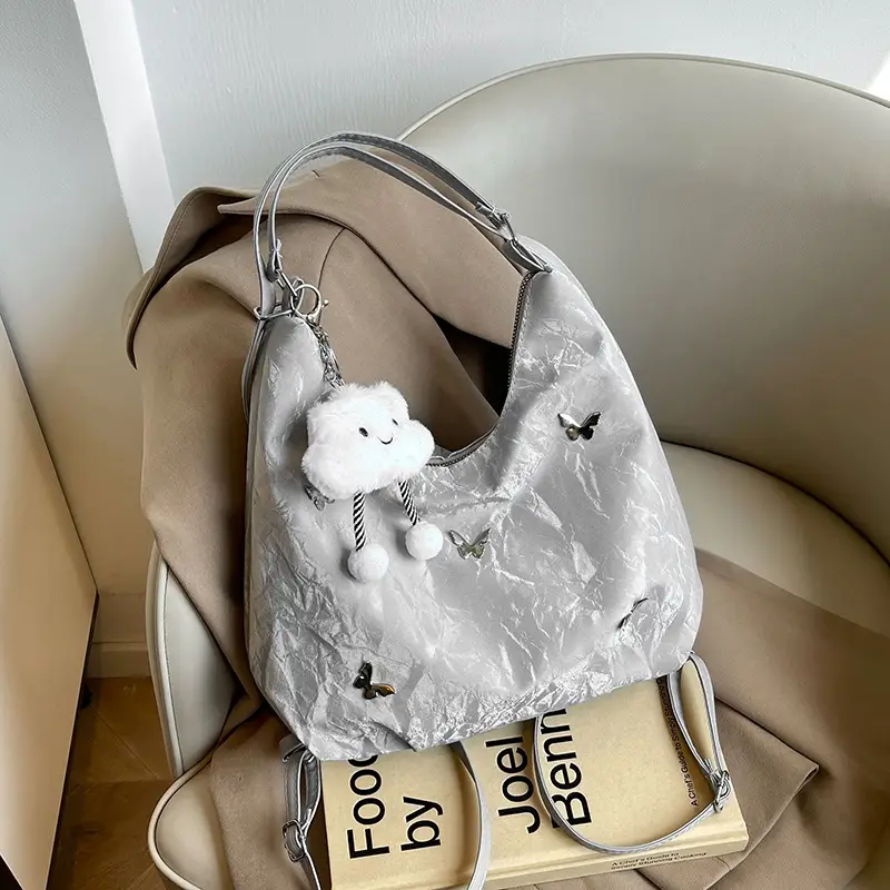 Silver Butterfly Shoulder Bag with Pom Pom Charm - Image 12