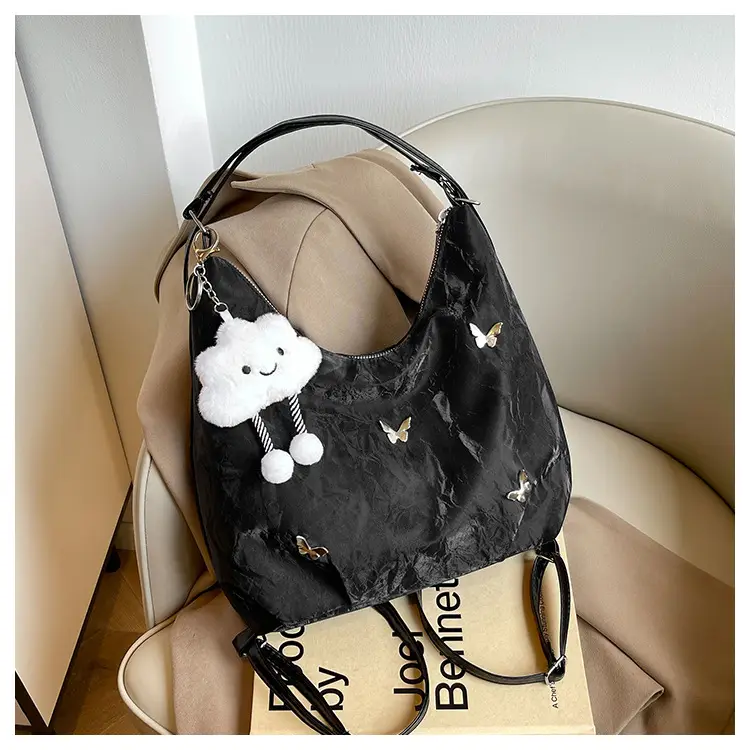 Silver Butterfly Shoulder Bag with Pom Pom Charm — feature 22