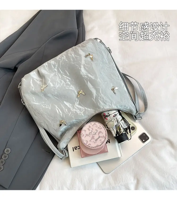 Silver Butterfly Shoulder Bag with Pom Pom Charm — feature 5