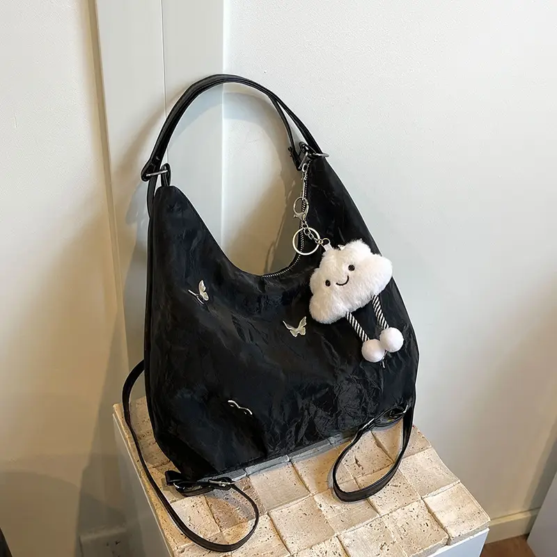 Silver Butterfly Shoulder Bag with Pom Pom Charm - Image 10