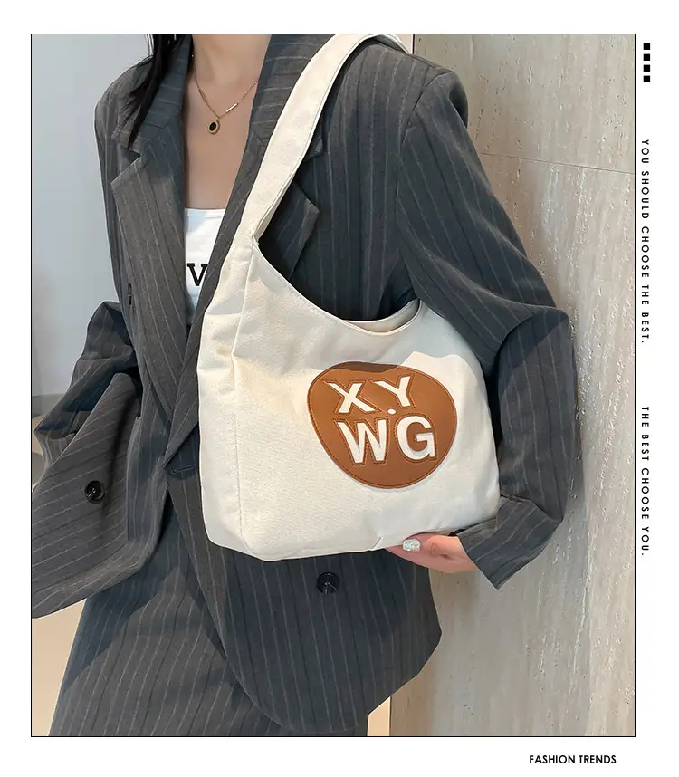 Blue Canvas Shoulder Bag with Logo Embossing — feature 1