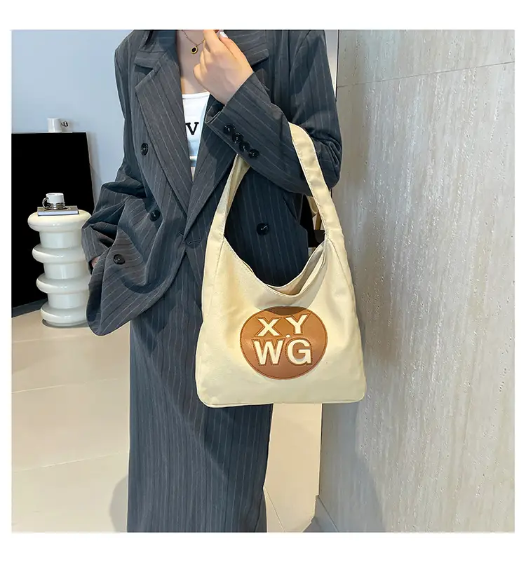 Blue Canvas Shoulder Bag with Logo Embossing — feature 12