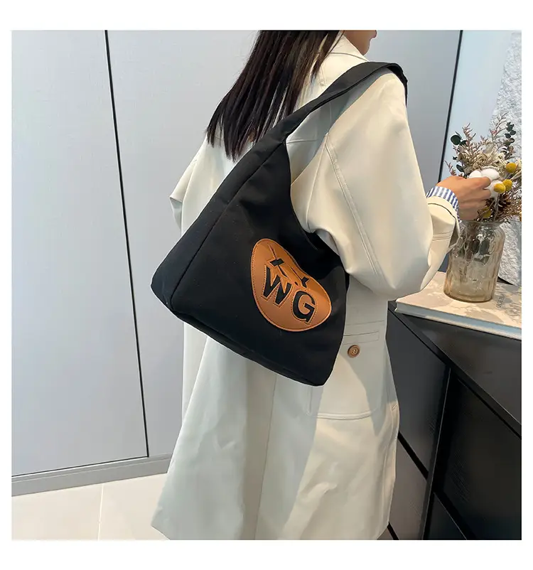 Blue Canvas Shoulder Bag with Logo Embossing — feature 16