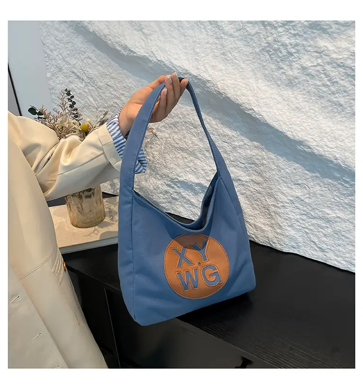 Blue Canvas Shoulder Bag with Logo Embossing — feature 19