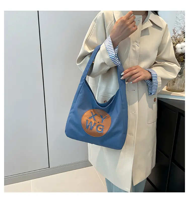 Blue Canvas Shoulder Bag with Logo Embossing — feature 20