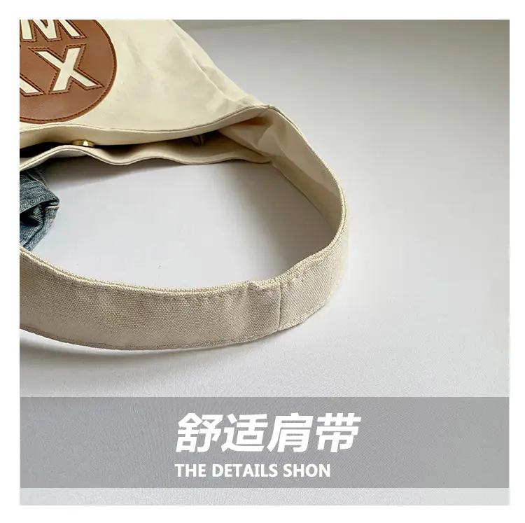 Blue Canvas Shoulder Bag with Logo Embossing — feature 4