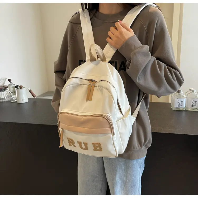 Mori Ins Style Black Letter Backpack with Pom Pom — feature 17