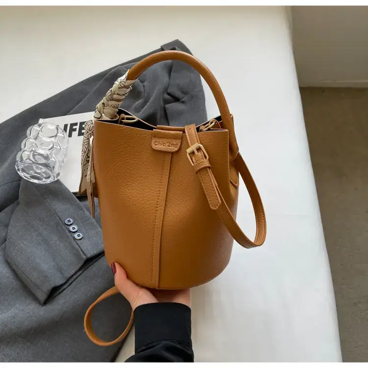 Black Leather Bucket Bag with Crossbody Strap — feature 20