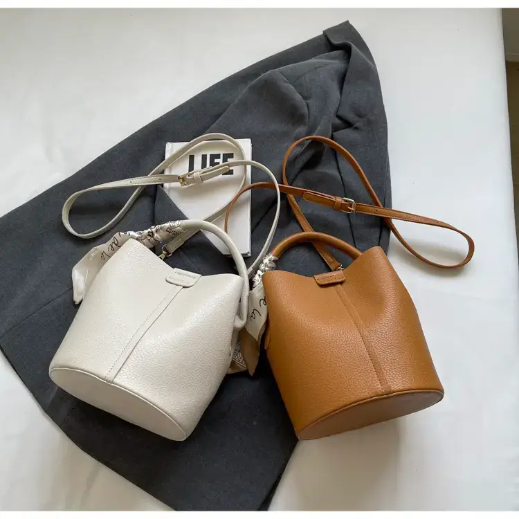 Black Leather Bucket Bag with Crossbody Strap — feature 21
