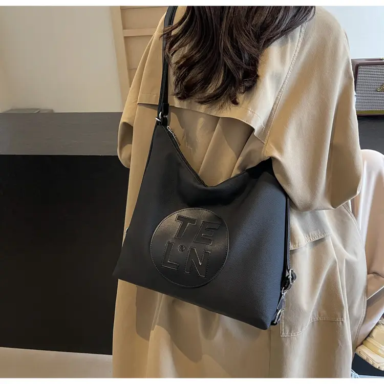Women's Black Canvas Tote Bag with TE LN Logo — feature 16