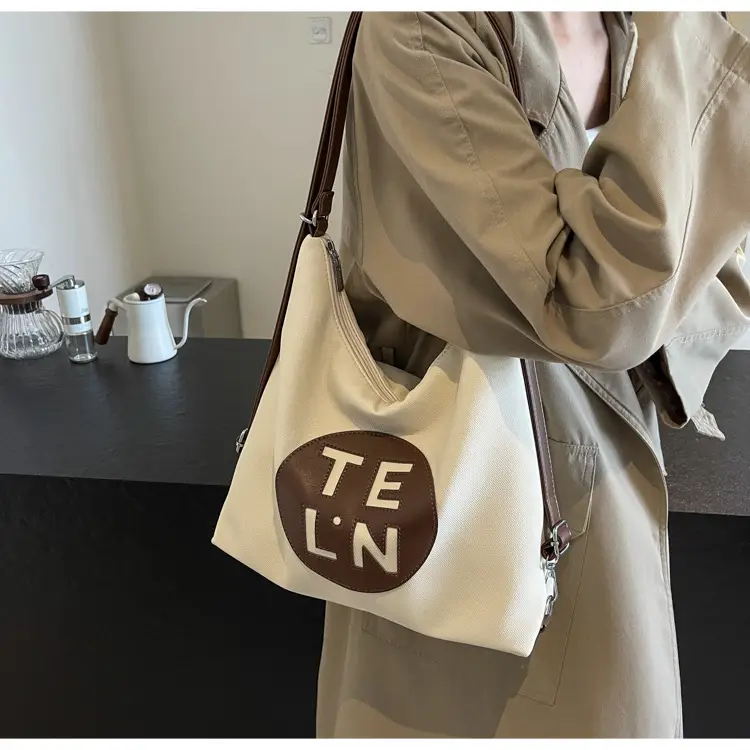 Women's Black Canvas Tote Bag with TE LN Logo — feature 24
