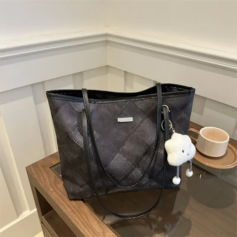 Women's Silver Quilted Shoulder Bag with Cute Pom Pom Design - Image 11