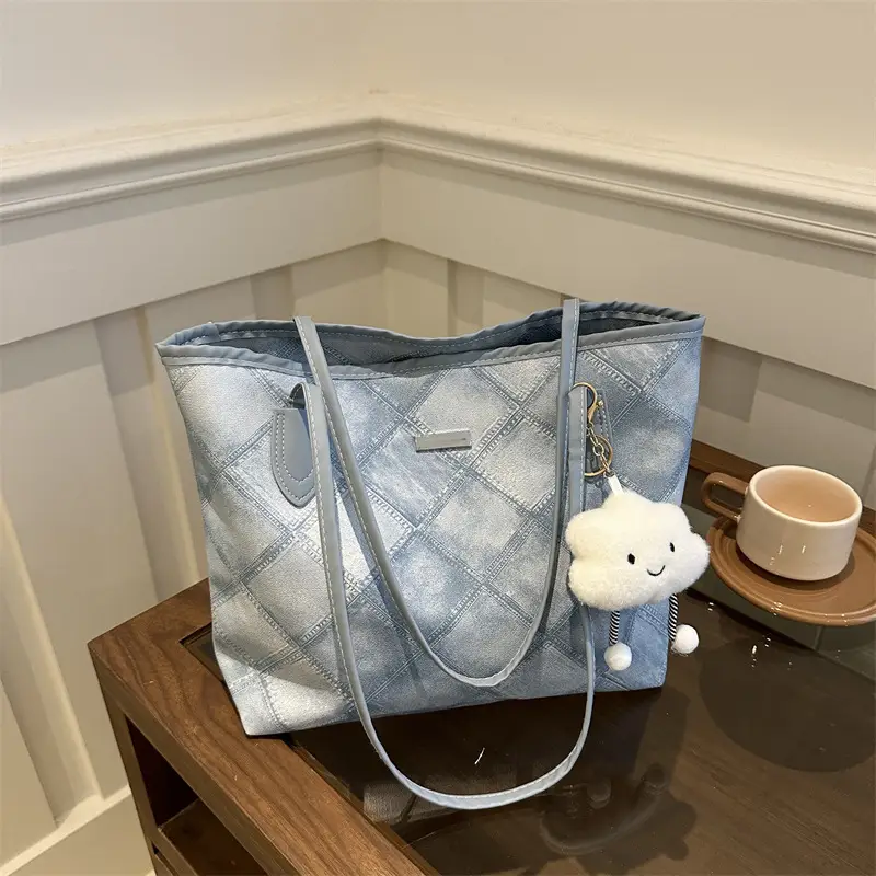 Women's Silver Quilted Shoulder Bag with Cute Pom Pom Design - Image 12